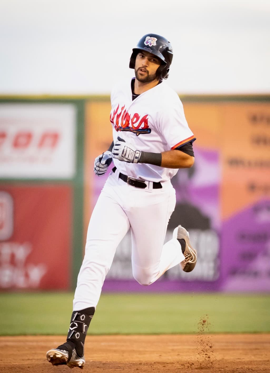 Casey Petersen running the bases during a baseball game